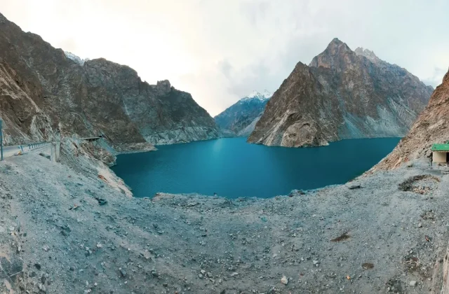 Turquoise alpine lake beneath jagged Karakoram peaks, one of the hidden gems of Pakistan in the country's far north